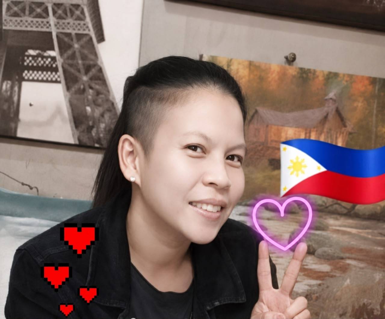 Owner-supplied portrait with a Philippines flag detail